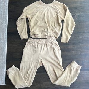 Sweatpants and a sweatshirt. Warned twice. Comes in set